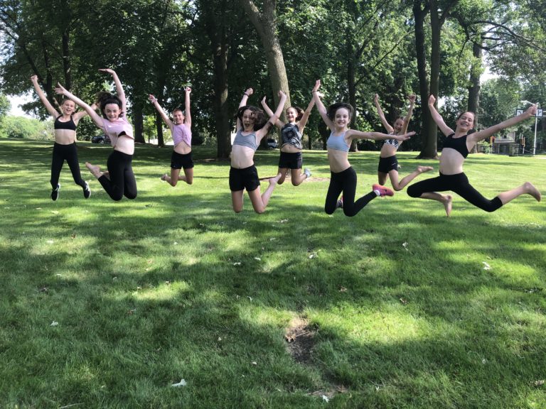 Kids jumping at a summer camp in a sunny park, enjoying outdoor activities and fun. Kids jumping at a summer camp in a sunny park, enjoying outdoor activities and fun.