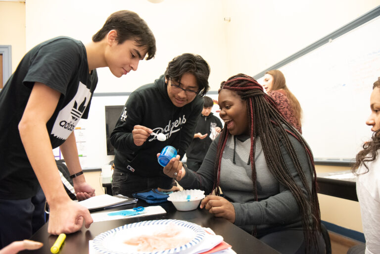 Students engaged in hands-on activity at summer camp, promoting creativity and teamwork in a fun learning environment. Students engaged in hands-on activity at summer camp, promoting creativity and teamwork in a fun learning environment.