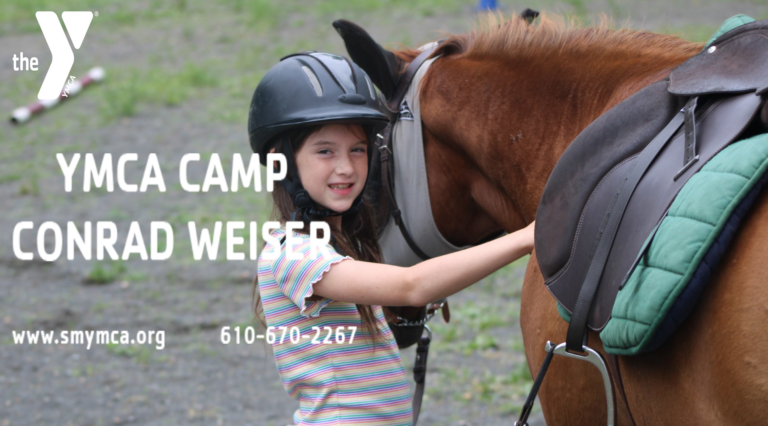 Young girl with helmet petting a horse at YMCA Camp Conrad Weiser, promoting summer camp activities. Young girl with helmet petting a horse at YMCA Camp Conrad Weiser, promoting summer camp activities.