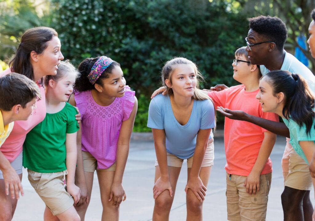 Kids enjoying group activities at summer camp, fostering teamwork and friendship. Perfect for a fun-filled camp experience!