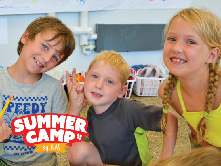 Summer camp kids: three smiling children during an indoor activity, playful group photo with camp logo Summer camp kids: three smiling children during an indoor activity, playful group photo with camp logo