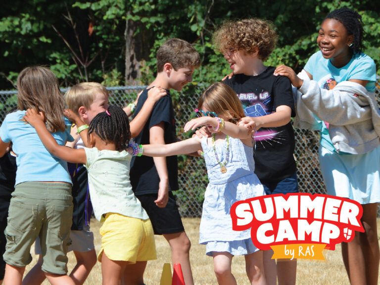 Children playing a team-building game outdoors at summer camp, smiling and linking arms. Children playing a team-building game outdoors at summer camp, smiling and linking arms.