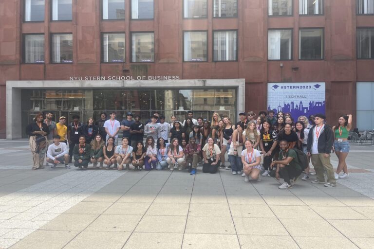 Large group of summer camp students posing outside NYU Stern School of Business on NYC campus Large group of summer camp students posing outside NYU Stern School of Business on NYC campus